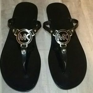 Michael Kors logo jelly flip flops